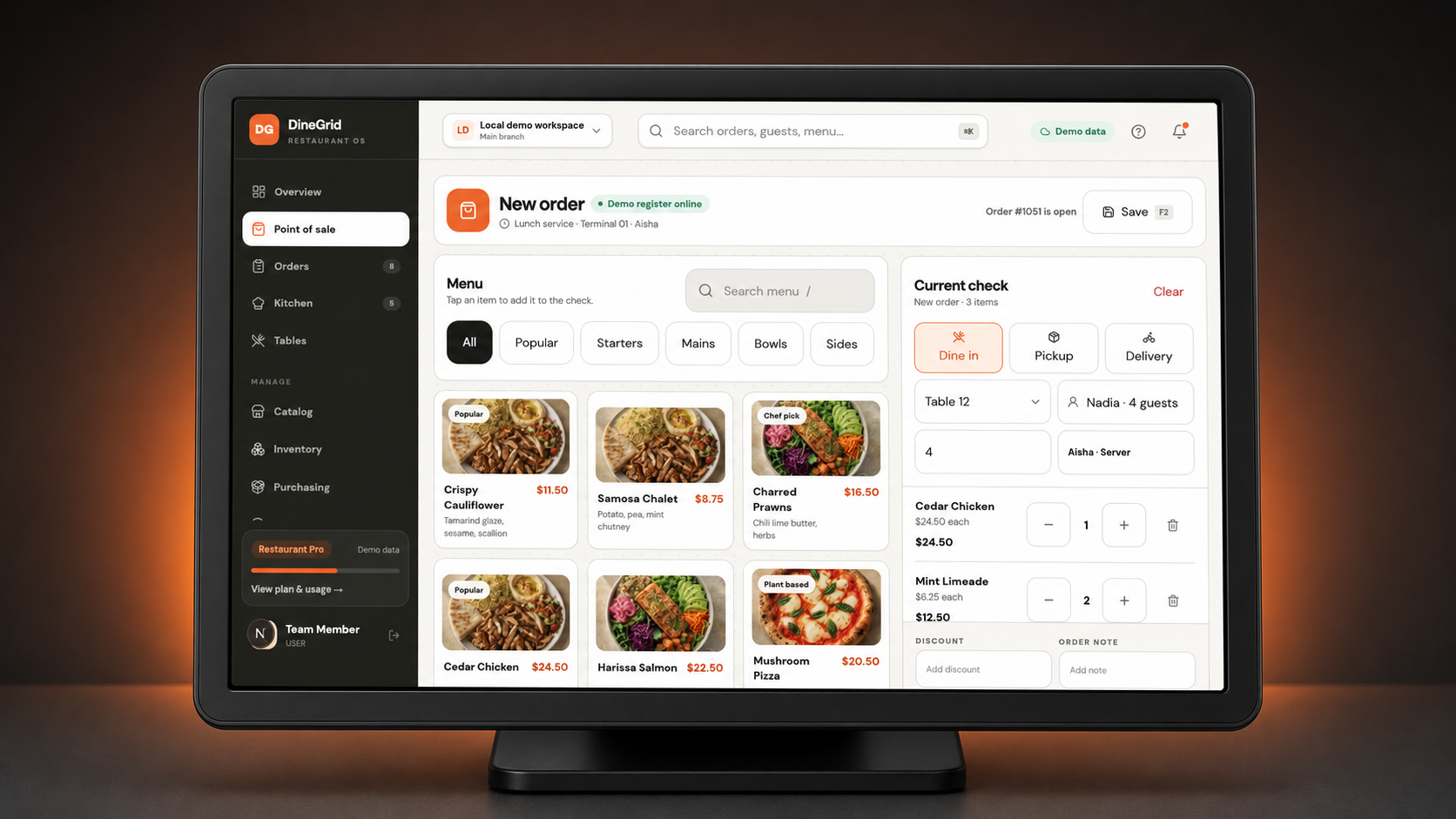 DineGrid touchscreen restaurant POS interface showing the live product grid and current order
